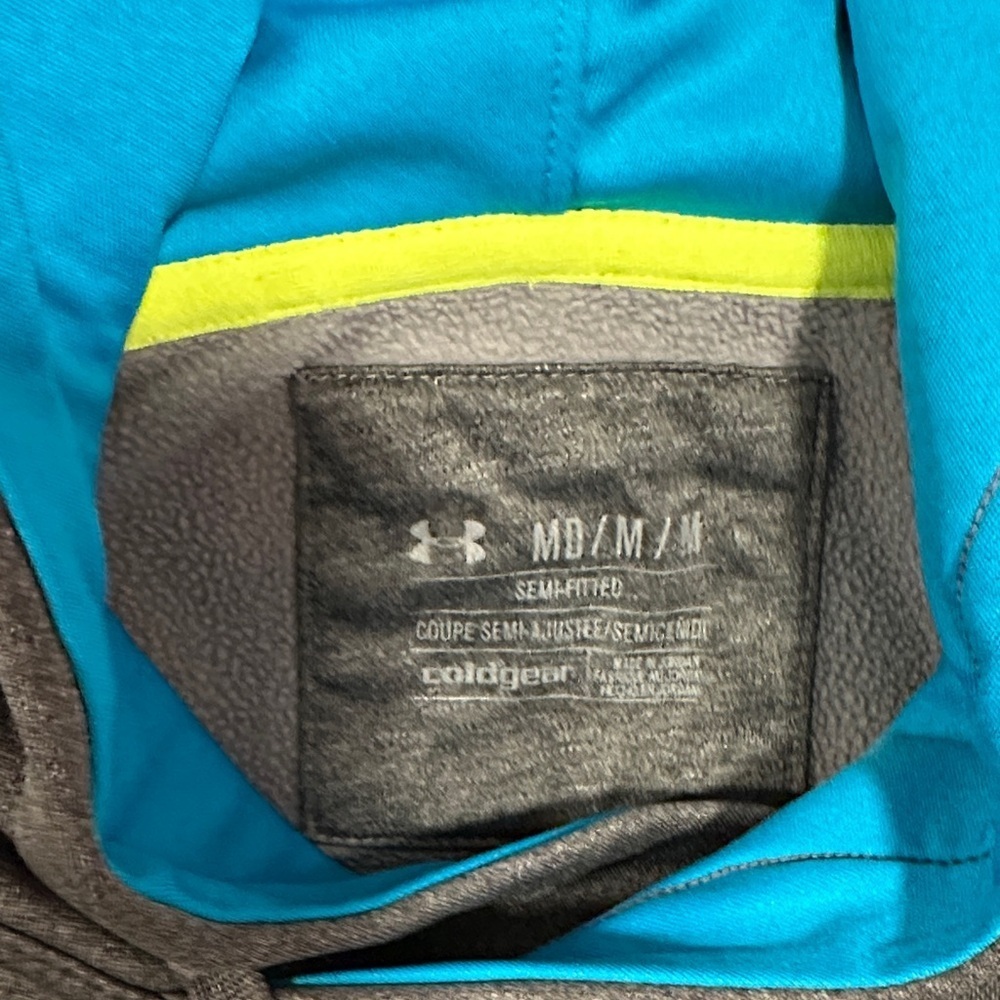 Under Armour Storm Semi Fitted Charcoal Gray Hoodie with Blue and Yellow logo. - Picture 6 of 7